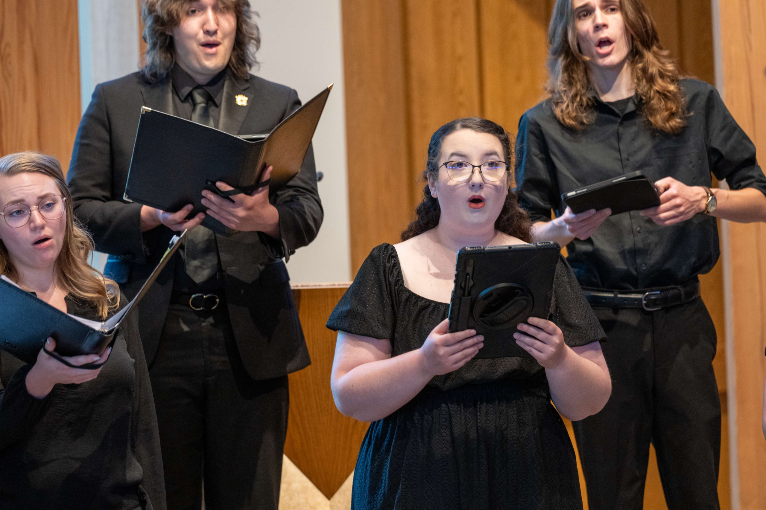 A quartet of Fox Chamber Singers performing together